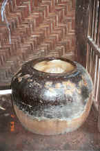 Jpeg 50K Huge jar full of sago used in the final rinsing of the dyed cotton to help stiffen and separate the threads ready for weaving - Amarapura, Shan State 9809f35.jpg