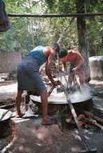 Jpeg 46K Working over the steaming dye bath - Amarapura, Shan State 9809g06.jpg
