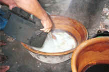 Jpeg 27K Further diluting the sago, oil and water rinse for the dyed cotton - Amarapura, Shan State 9809g08.jpg