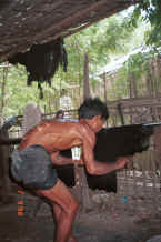 Jpeg 35K Straightening out the dyed hanks of thread after rinsing - Amarapura, Shan State 9809g12.jpg