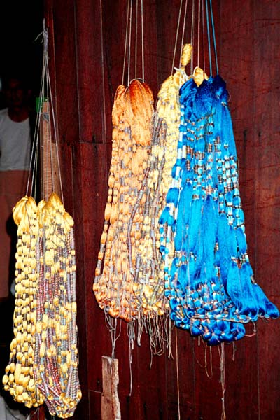 60K Jpeg 9809P14 Bundles of dyed silk weft threads waiting to be woven at a weaving mill at Innbawkon (Inpawkhon) on Lake Inle, Shan State.