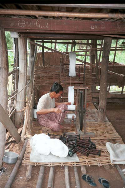 Jpeg 47K Winding off thread for weaving prior to the dyeing process - Lake Inle, Shan State.