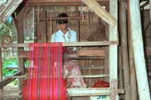 Jpeg 45 K 9809R06 Weaving Shan bags under a house off a waterway at the back of the floating market at Ywa-ma- Lake Inle, Shan State.