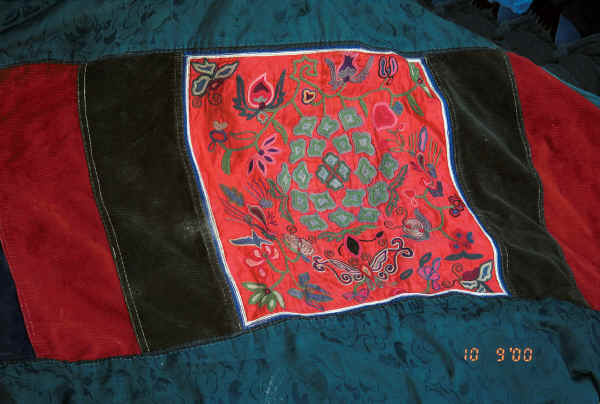 Bouyei baby-carrier with the colours mellowed by use - Bi Ke village, Mi Gu township, Zhenfeng county, Guizhou province 0010s28A.jpg
