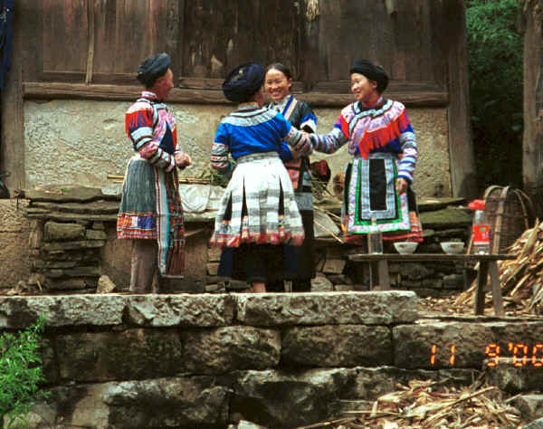 Miao women waiting to welcome us to the village - Chang Tion village, Cheng Guan township, Puding county, Guizhou province 0010w06.jpg