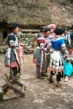 Jpeg 67K Miao women gathered outside houses showing off their embroidery skills - Chang Tion village, Cheng Guan township, Puding county, Guizhou province 0010w16.jpg