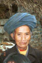 Jpeg 38K Miao woman - although she is wearing a manufactured coat her turban looks to be hand woven and hand dyed with indigo - Chang Tion village, Cheng Guan township, Puding county, Guizhou province 0010w32.jpg