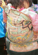 Jpeg 44K Miao baby carrier in the Side Comb Miao style - Close-up of couched embroidery baby carrier - Chang Tion village, Cheng Guan township, Puding county, Guizhou province 0010w37.jpg