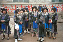 Jpeg 52K Black Miao girls gathering to welcome us in their festival costumes - Dai Lo village, Shi Zi township, Ping Ba county, Guizhou county 0010z15.jpg