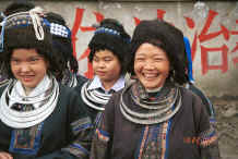 Jpeg 41K Two generations of Black Miao women in their festival costumes - Dai Lo village, Shi Zi township, Ping Ba county, Guizhou county 0010z17.jpg