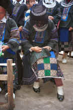 Jpeg 40K Black Miao girl demonstrating her embroidery on a piece for a woman's jacket - Dai Lo village, Shi Zi township, Ping Ba county, Guizhou county 0010z25.jpg