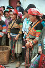 Jpeg 47K Flower Miao women together with some Side Comb Miao with their textiles, De Wo market, De Wo township, Longlin county, Guangxi province. 0010f36.jpg