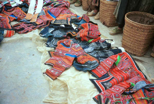 Flower Miao clothing laid out for us to purchase - De Wo market, De Wo township, Longlin county, Guangxi province.0010f37.jpg