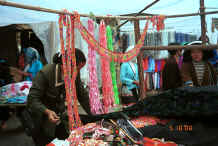 Jpeg 42K Market stall with trimmings for Miao traditional style costumes - De Wo market, De Wo township, Longlin county, Guangxi province 0010g21.jpg