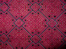 to Jpeg 104K MGP1289e Detail of the embroidery from the main part of a Ge Jia baby carrier from Pamela's collection which may have been removed from the original carrier. This was purchased by Pamela in 2000 but probably collected earlier in the Kaili area. Estimated age, last quarter of the 20th century. 