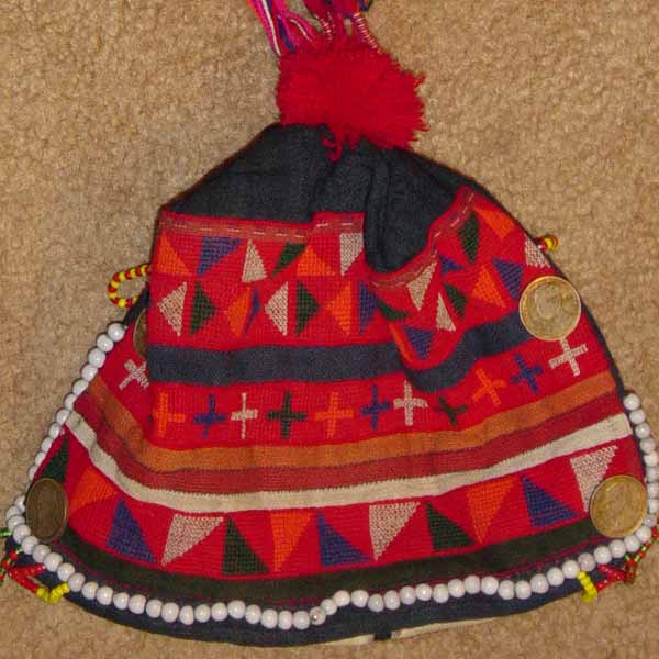 41K Jpeg Hani child's emboridered and trimmed hat, Menghai county, Yunnan province, southwest China