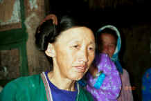 Jpeg 28K Side comb Miao woman showing the traditional hair fashion on which the Han Chinese base the name of this group of Miao - Long Dong village, De Wo township, Longlin country, Guangxi province 0010e16.jpg