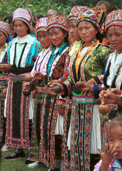 White Miao women welcoming us with gourd cups full of alcohol in Ma Wo village, Zhe Lang township, Longlin county, Guangxi province 0010j02.jpg