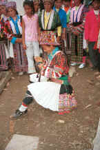 Jpeg 47K White Miao woman working on her embroidery, probably for a head wrapping in Ma Wo village, Zhe Lang township, Longlin county, Guangxi province 0010j09.jpg