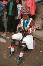 Jped 30K White Miao woman working on her embroidery, probably for a head wrapping in Ma Wo village, Zhe Lang township, Longlin county, Guangxi province 0010j10.jpg