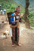 Jpeg 41K White Miao woman splicing lengths of hemp or ramie 0010j15.jpg
