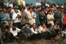 Jpeg 39K Crowd of White Miao men, some playing instruments, Ma Wo village, Zhe Lang township, Longlin county, Guangxi province 0010j25.jpg