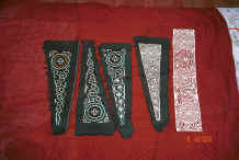 Jpeg 44K close up of a finished paper cut and partly embroidered paper cuts from Side Comb Miao Pao Ma Cheng village, Teng Jiao township, Xingren country, Guizhou province 0010r14.jpg