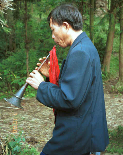 Musician leading us into the village - Sha Jiao village, Wan Teng township, Xingyi metropolitan area, Guizhou province 0010l20A.jpg