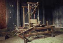 to Jpeg 55K Weaving loom, in a village in Songtao Miao Autonomous County, Tongren Prefecture, eastern Guizhou Province.