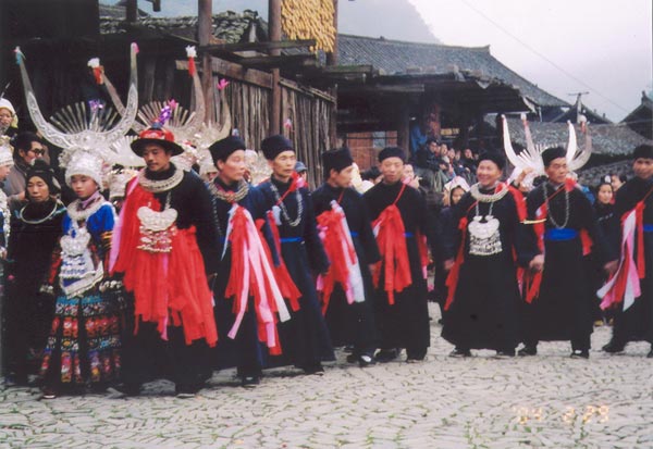Jpeg 54K e17e The Shaman and and leading men of the village at the dancing on 29 February 2004, Langde village, Guizhou province