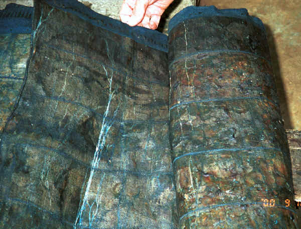 Big Flower Miao skirt length (ramie or hemp) which has been covered with wax on both sides as a resist and then dyed in indigo - Xian Ma village, Hou Chang township, Puding county, Guizhou province 0010y09.jpg