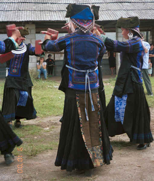 Young Black Miao girls dancing.  Zuo Qi village, Min Gu township, Zhenfeng county, Guizhou province 0010p22.jpg
