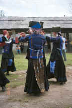 Jpeg 39K Young Black Miao girls dancing.  Zuo Qi village, Min Gu township, Zhenfeng county, Guizhou province 0010p22.jpg
