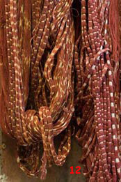 to 77K Jpg - ikat, partly dyed, at Watublapi. The brown color becomes deeper if the yarn is left slightly damp after dyeing. Which might partly account for the unique smell of naturally dyed Morinda textiles