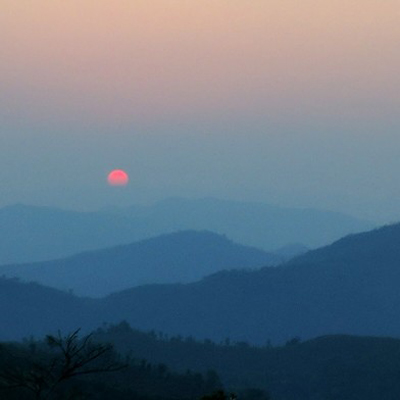 sunset over the mountains of Houaphan Province, Laos