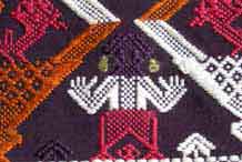 to Jpeg 51K A new (end 20th beginning 21st century) woven fragment showing an ancestor figure. Woven in cotton, probably chemical dyed supplementary weft coloured threads. 
