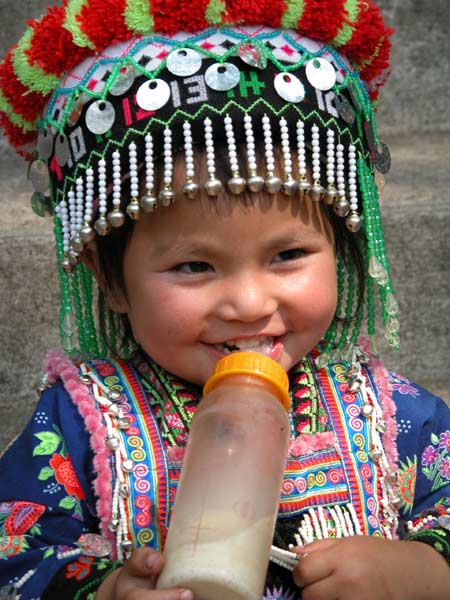 Jpeg 56K Young White Hmong girl in her festival finery  3311