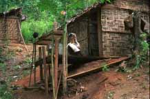 Jpeg 42K Padaung woman outside the back of her house 8823i22