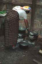 Jpeg 25K Padaung woman cooking 8812i23