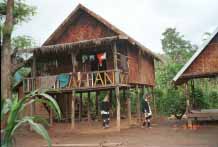 Jpeg 54K 2 Padaung women outside a house 9809q05