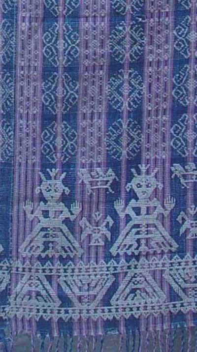 Jpeg 51K A detail of an ancient blanket. These blankets have anthropomorphic and zoomorphic figures reminiscent of Chinese and possibly Indonesian design; Iloilo, Philippines