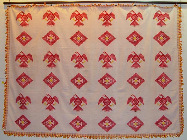 70K jpg 02 - Itneg cotton decorative cloth with Spanish diamond eagle design, Northern Luzon, early 20th century. This piece was made from hand-spun, hand-woven cotton and is signed with the weaver's embroidery. 154 cm x 220 cm without fringe