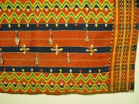 to 71K Jpg 18 - Detail 2 of Kalinga woman's cotton wrap-around skirt with beadwork and mother of pearl fragments, Apayo Province and parts of Abra Province, Northern Luzon, 20th century. 70 cm x 112 cm