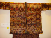 to 65K Jpg 22 - Detail 1 of Bla'an (possibly T'boli) man's abaka and ikat jacket and trousers, Mindanao, early 20th century. Jacket 152 cm x 56 cm x 52 cm. Trousers 56 cm x 44 cm