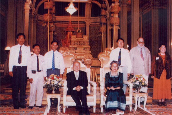 ss15 Jpeg 57K Me and Chris in the Cambodian throneroom. We're the two on the right of Queen Monique. I'm wearing a jacket of Khmer silk made by a friend. How sad …. 