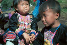 to Jpeg 38K Blue Hmong young girl and boy in a village on Doi Suthep above Chiang Mai 8812l12