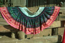 to Jpeg 47K Blue Hmong skirt hanging out to dry in a village on Doi Chiang Dao on the road from Chiang Mai to Fang 8812n27A