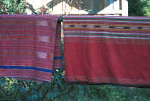 to Jpeg 30K Two hand woven sarongs of mainly koh (red) dyed cotton with additional ikat dyed and plain dyed stripes  8812o34.jpg