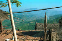 to Jpeg 34K Looking down the valleys from the verandah of a U Lo-Akha house in a village in the hills around Chiang Rai 8812p21.jpg