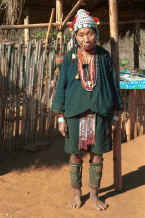 to Jpeg 35K Old U Lo-Akha woman smoking a pipe in a village in the hills around Chiang Rai 8812p30.jpg